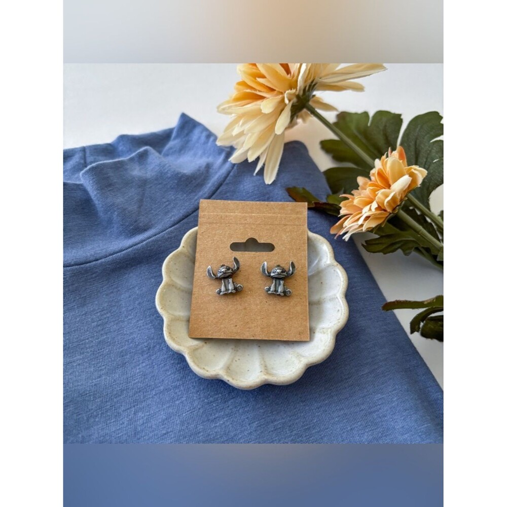 Disney Stitch earrings.